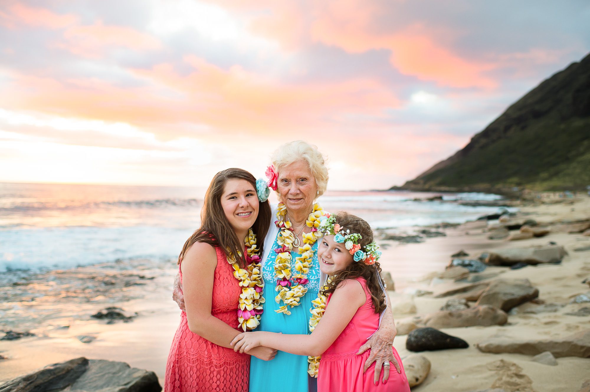 It is always a pleasure to capture the many visitors to this beautiful island.  Photographs make some of the best souvenirs of a vacation that often passes in a blur.  As an Aulani Family Photographer, I often have the opportunity to capture multi-generational families vacationing together.  This is true of this delightful family who brought Grandma on vacation with them.  The bond between grand-daughters and grandmother was evident from the get go.  This is perhaps one of my favorite relationships to capture. I relate so well to this special relationship, having had such a strong connection with my own grandmother growing up.  She is one of my most favorite people on earth, not unlike these two girls and their granny.  