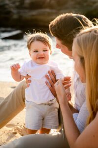 Baby smiling at camera