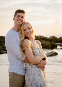Couple on the beach at sunset in Hawaii